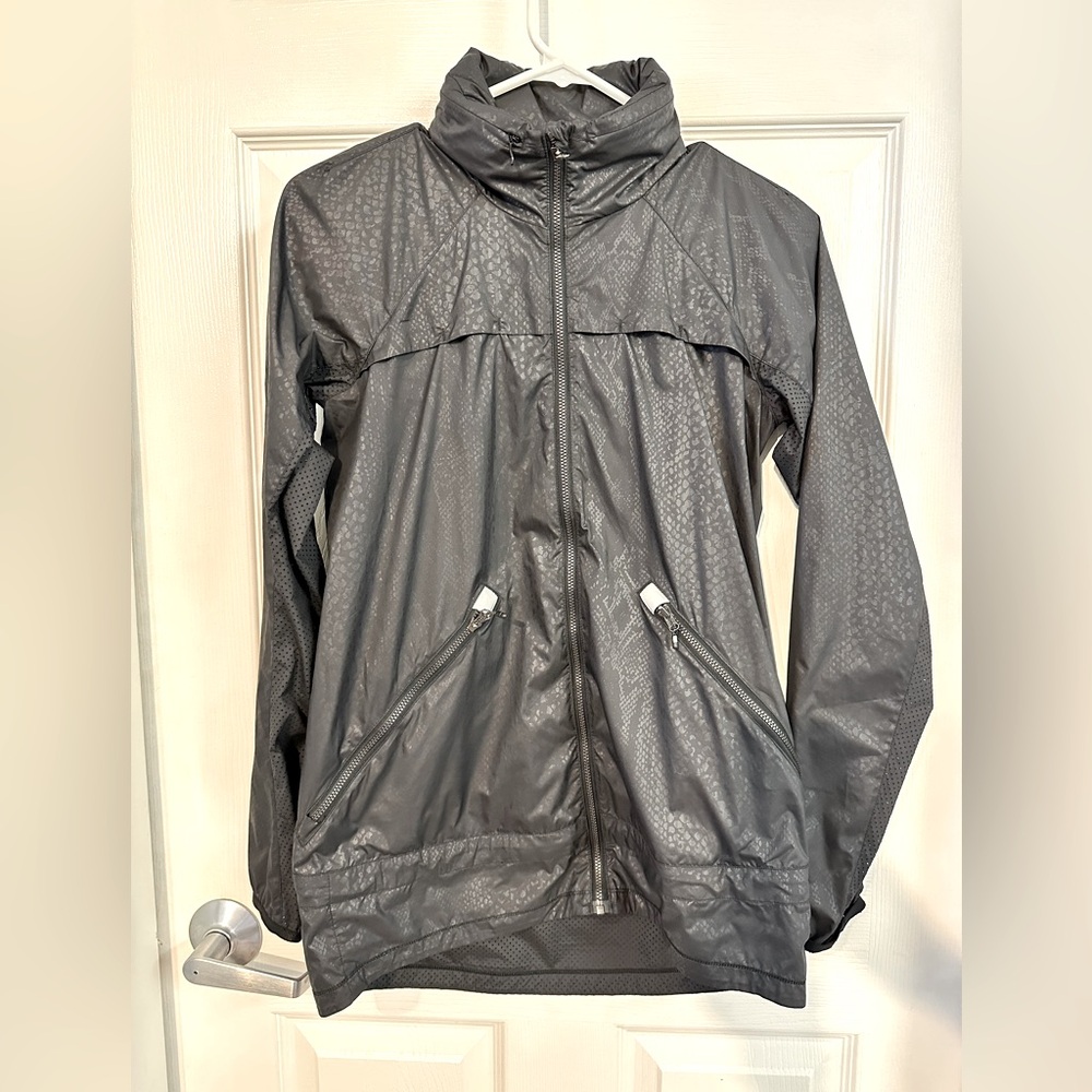 Lululemon Windbreaker with packable hood. Vented underarms & sleeves size: 2